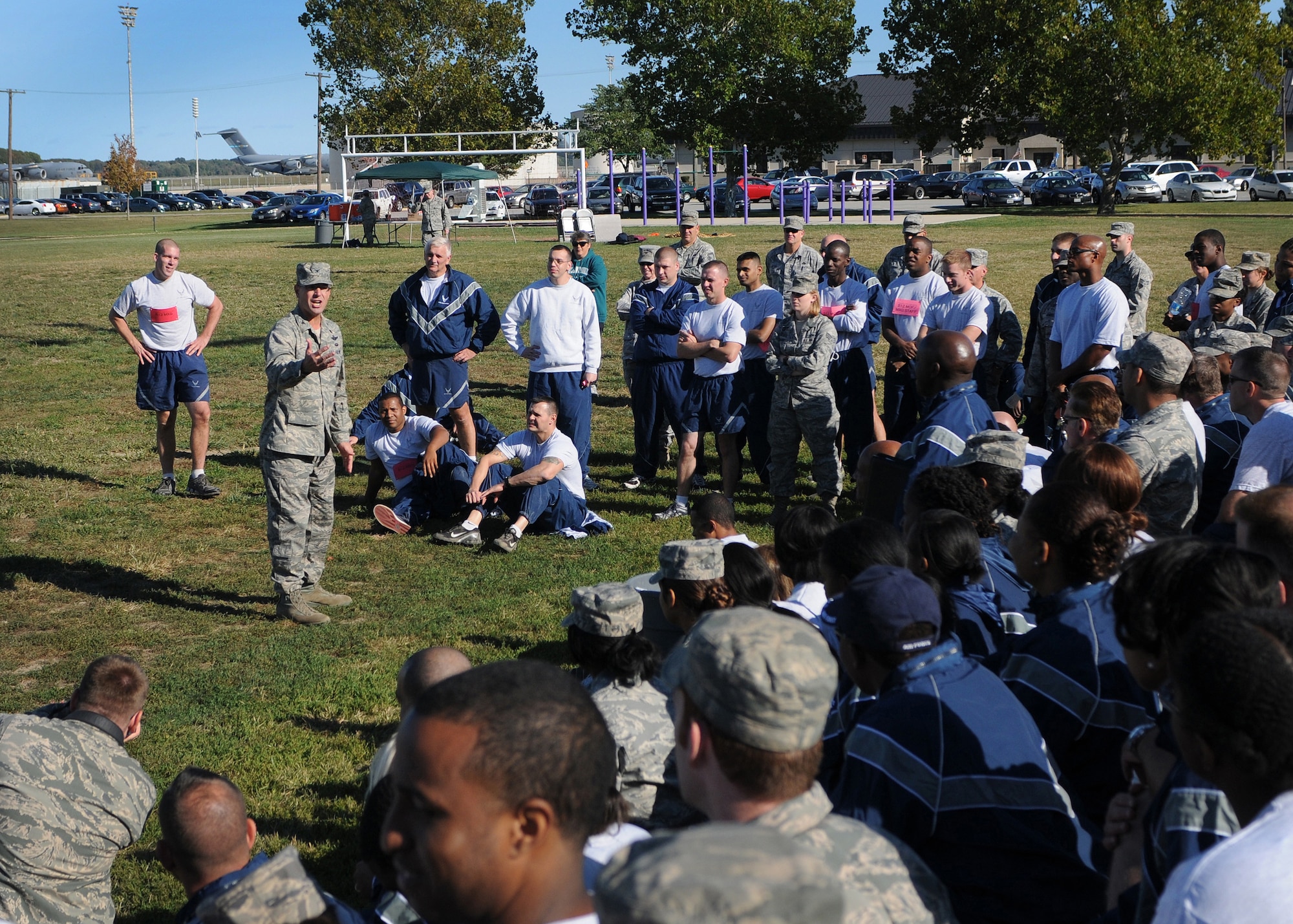 Col. Raymond A. Kozak, 512th Airlift Wing commander, emphasizes the importance of physical fitness as he addresses the crowd at the 2012 Ultimate Fitness Challenge Oct. 13, 2012, at the track, Dover Air Force Base, Del. The event included contests in pushups, sit-ups, tug-of-war, a lap walk and a relay race. (U.S. Air Force photo by Senior Airman Erika Brooke)