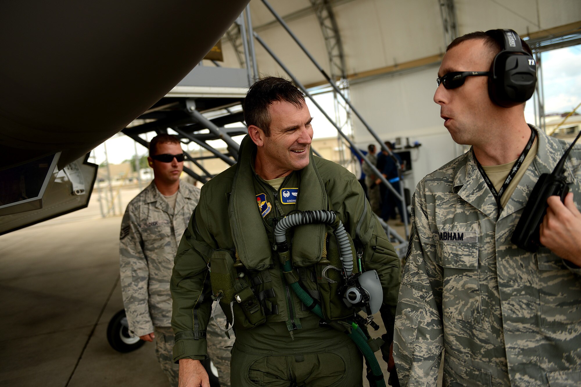 F-35A Lightning II joint strike fighter pilot wing commander Col. Andrew Toth from the 33rd Fighter Wing and production superintendent Master Sgt. Scott Grabham talk about his flight after flying a local training mission over the Emerald Coast Sept. 18, 2012 Eglin Air Force Base, Fla. (U.S. Air Force photo/Master Sgt. Jeremy T. Lock)