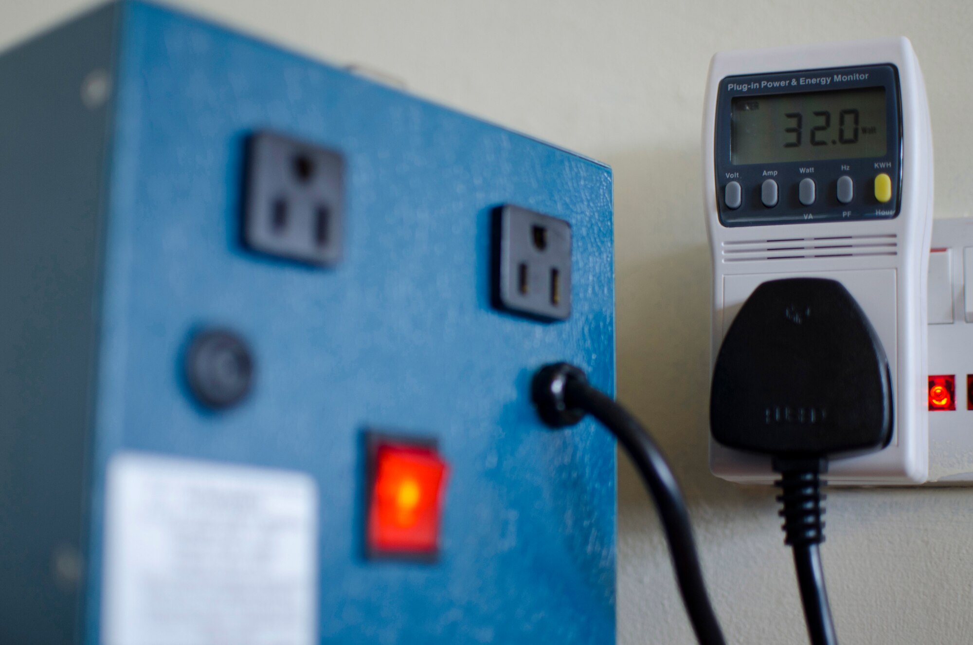 ROYAL AIR FORCE LAKENHEATH, England – A power and energy monitor displays the amount of watts a small transformer is using without having any appliances plugged into it. The 48th Fighter Wing created and is implementing the Transformer Cut Off Initiative, a U.S. Air Forces in Europe-wide energy savings initiative, which is slated to save the 48th FW $750,000 per year. (U.S. Air Force photo by Staff Sgt. Stephen Linch)