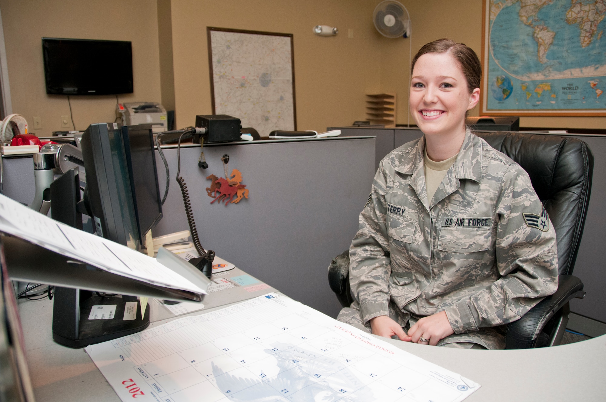 Senior Airman Meagan Terry, 189th Airlift Wing command post journeyman, mentors Airmen on records, safety, defense travel systems, and upcoming controlled unclassified information. (U.S. Air Force photo by Airman 1st Class Ian Caple)