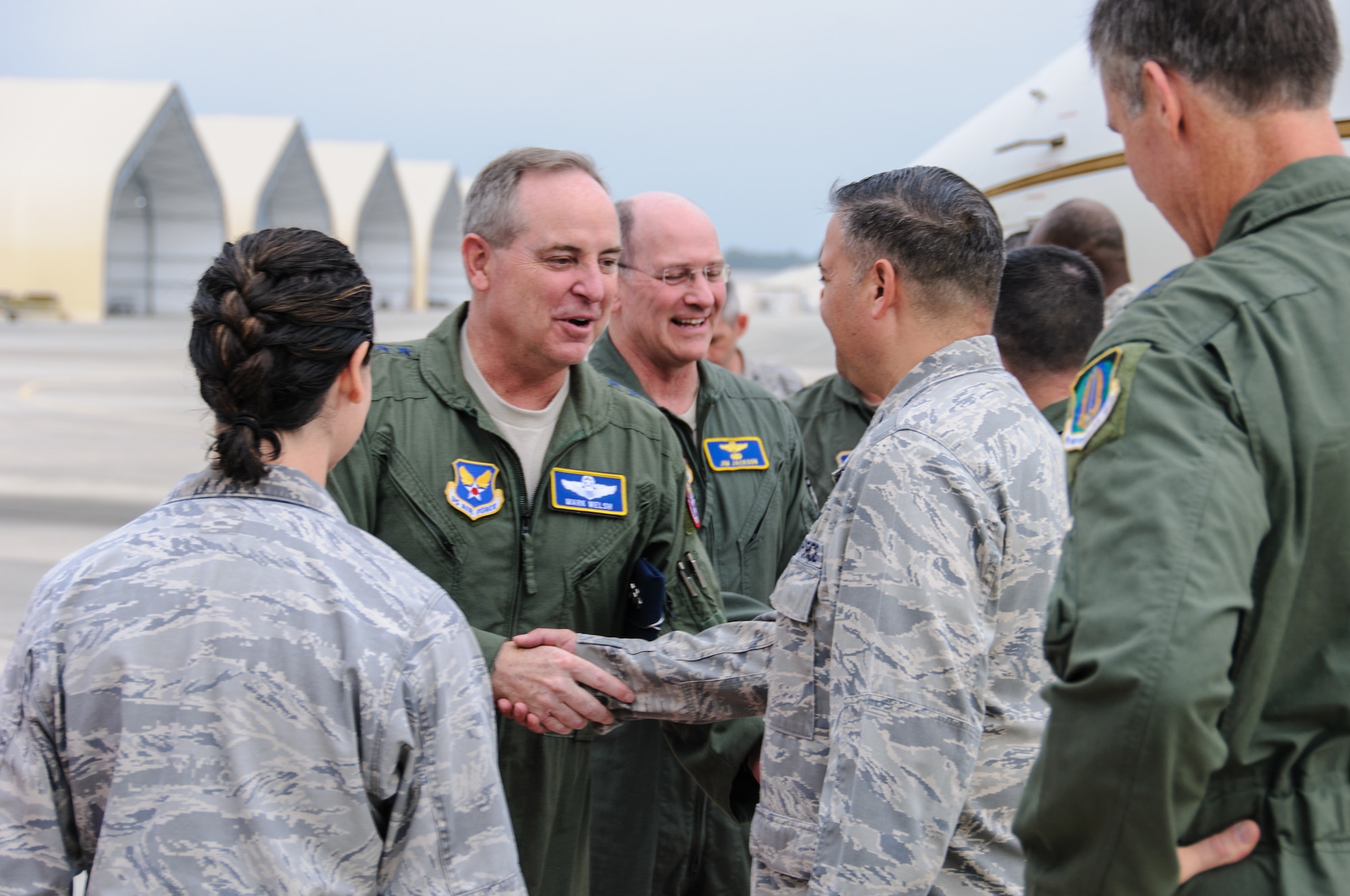 Air Force Chief of Staff Gen. Mark A. Welsh III shakes hands with Col. Richard L. Folks II, vice commander of the 689th Combat Communications Wing at Robins Air Force Base, Ga. Standing next to Welsh is Lt. Gen. James F. Jackson, commander of Air Force Reserve Command. Welsh visited the base for an orientation of Air Force Reserve Command and to discuss issues affecting the Total Force. (U.S. Air Force photo/Staff Sgt. Alexy Saltekoff)