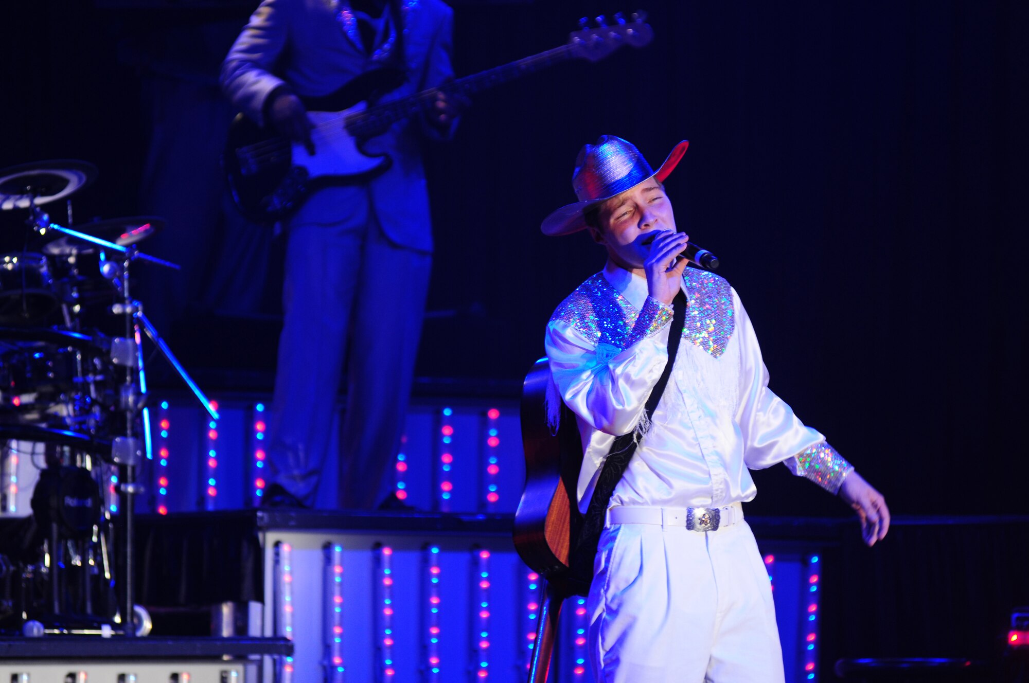 ROYAL AIR FORCE LAKENHEATH, England – Senior Airman Timothy Sentz, Tops In Blue vocalist, performs at Hangar 7 Oct. 11, 2012. The Tops In Blue 2012 World Tour, entitled “Listen,” features songs by Whitney Houston, Maroon 5, Carrie Underwood, Lady Antebellum and many others. Tops In Blue tours every year visiting stateside bases and overseas locations providing entertainment for Airmen, families and members of the local community.  (U.S. Air Force photo by Airman 1st Class Cory D. Payne)