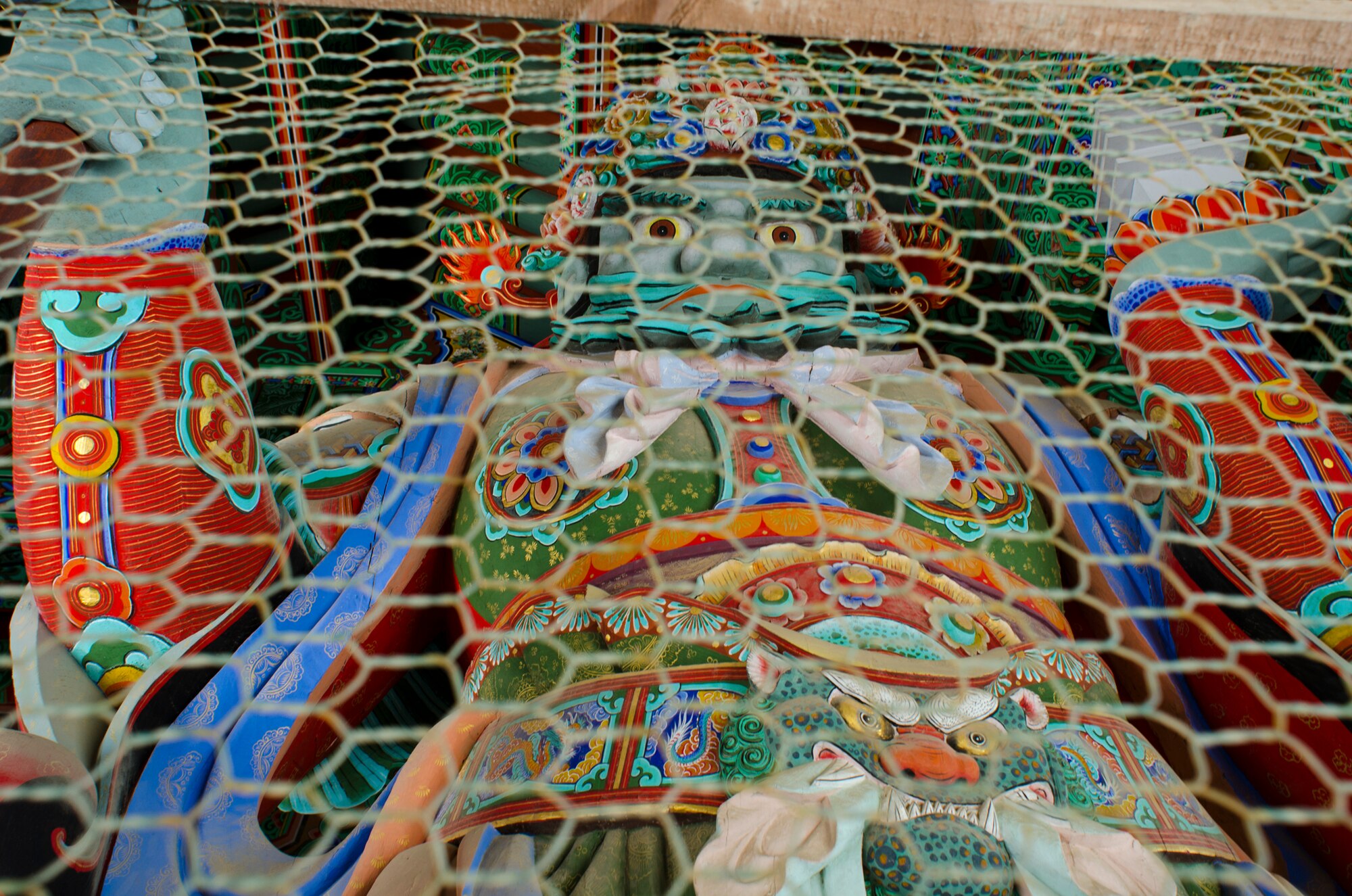 One of South Korea’s colorful deities watches over visitors to the Gumsan Temple in Gumsan, South Korea, Oct. 14, 2012. Visiting religious sites is one way American service members can get a better understanding of their host culture. (U.S. Air Force photo/Tech. Sgt. Michael Schocker)