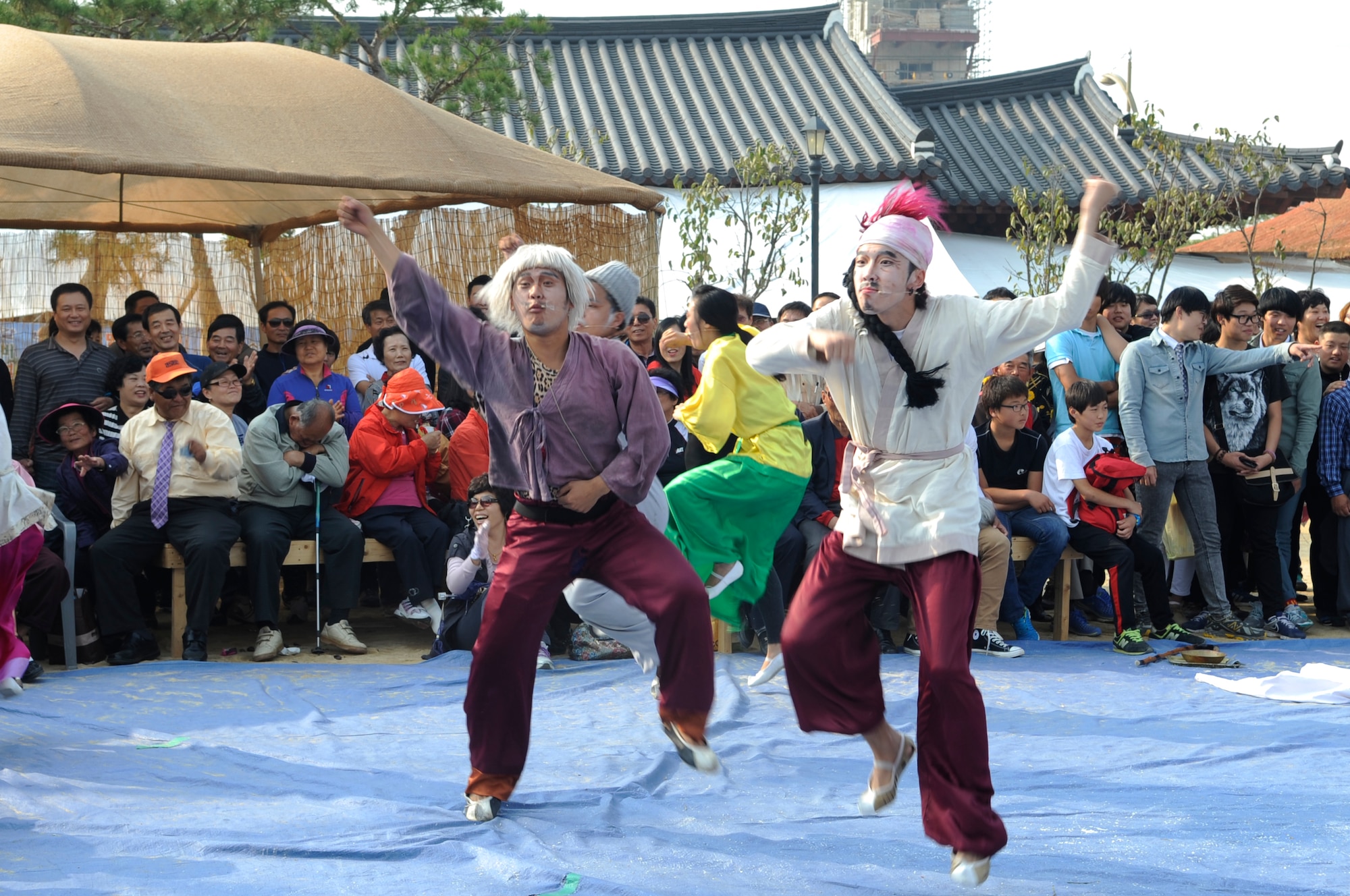 Actors at the Gimje Horizon Festival dance to “Gangnam Style” by South Korean singer Psy, Oct. 14, 2012, in Gimje, South Korea. This was the 14th year the city held the festival, which celebrates unique aspects of South Korean culture and its harvest season. (U.S. Air Force photo/Senior Airman Brigitte N. Brantley)