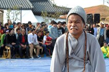 An actor at the Gimje Horizon Festival performs a comedic skit for the crowd Oct. 14, 2012, in Gimje, South Korea. About 60 Wolf Pack members traveled to the festival to learn more about South Korean culture and agriculture. (U.S. Air Force photo/Senior Airman Brigitte N. Brantley)