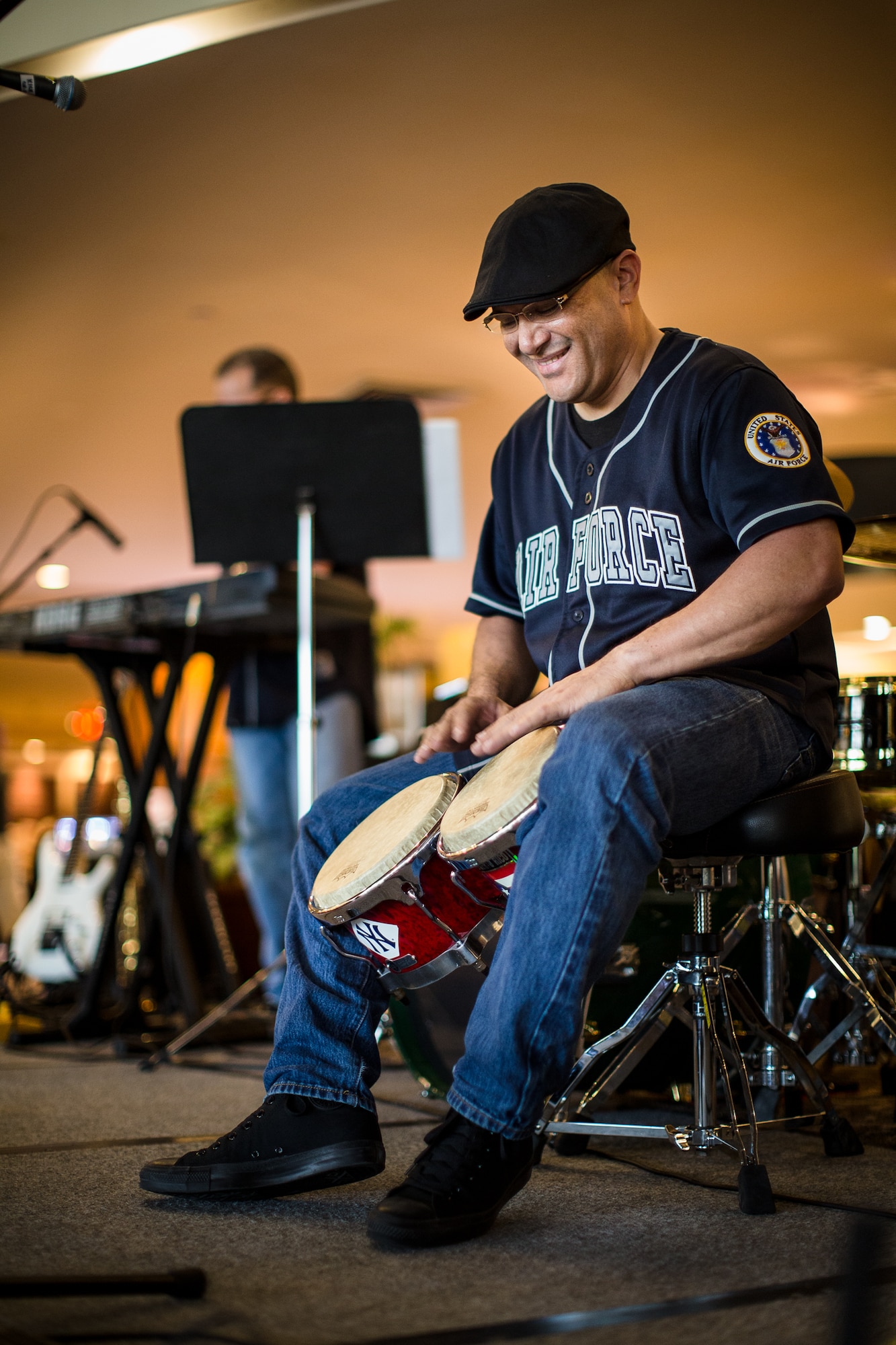 TUMON BAY, Guam -- Staff Sgt. Freddie Cruz, Band of the Pacific-Asia percussionist, plays the bongos for a latin tune at the Outrigger Hotel, Tumon Bay, Guam, on Oct. 14, 2012. "Latin music is very popular here in Guam," stated Cano Cruz, Pacific Trends' sponsor. "It's very beneficial that Pacific Trends has latin capabilities which reach people in ways no other genre can." (U.S. Air Force photo/Staff Sgt. Josh Voyles)