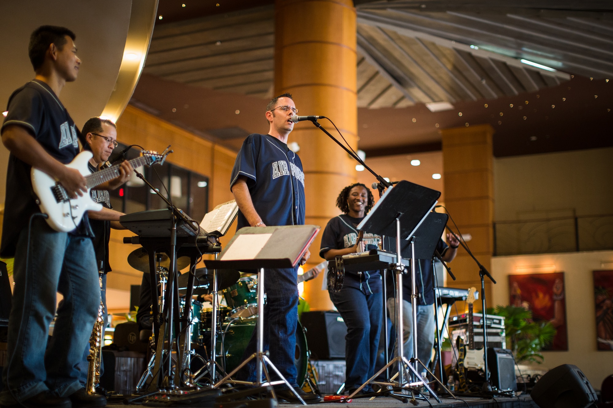 TUMON BAY, Guam -- Pacific Trends, Band of the Pacific-Asia popular music ensemble, plays inside the hotel lobby at the Outrigger Hotel, Tumon Bay, Guam, on Oct. 14, 2012. This was the final performance of three during Pacific Tends' tour. (U.S. Air Force photo/Staff Sgt. Josh Voyles)