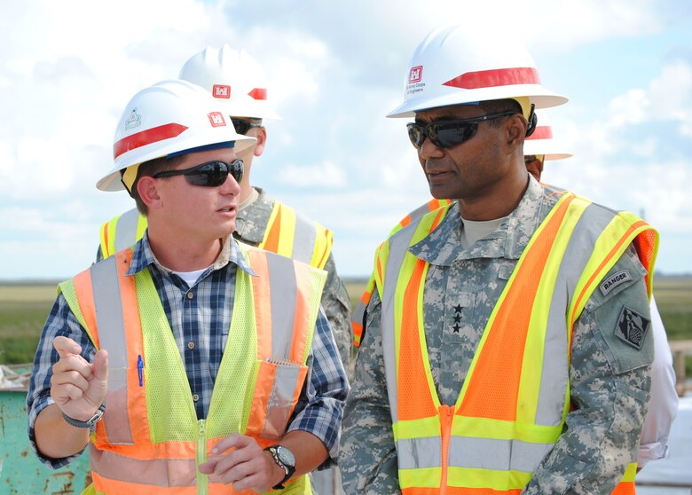 Chris Rego, U.S. Army Corps of Engineers Jacksonville District civil engineer, discusses construction of the Tamiami Trail Modifications project with Lt. Gen. Thomas P. Bostick, commanding general of the U.S. Army Corps of Engineers Oct 10, 2012.