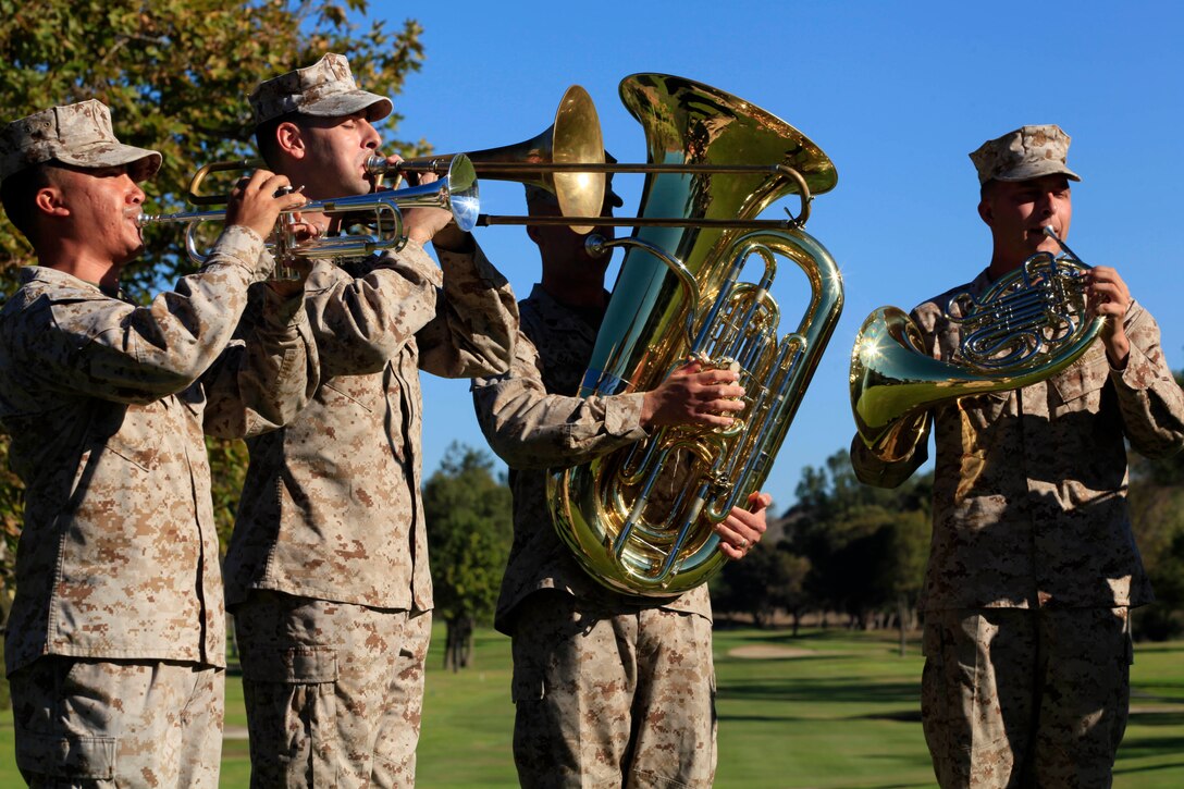 1st Marine Division Band plays the national anthem during the opening ceremony of the Commanding General’s 1st Invitational Golf Tournament at Camp Pendleton’s Marine Memorial Golf Course, Oct. 15.