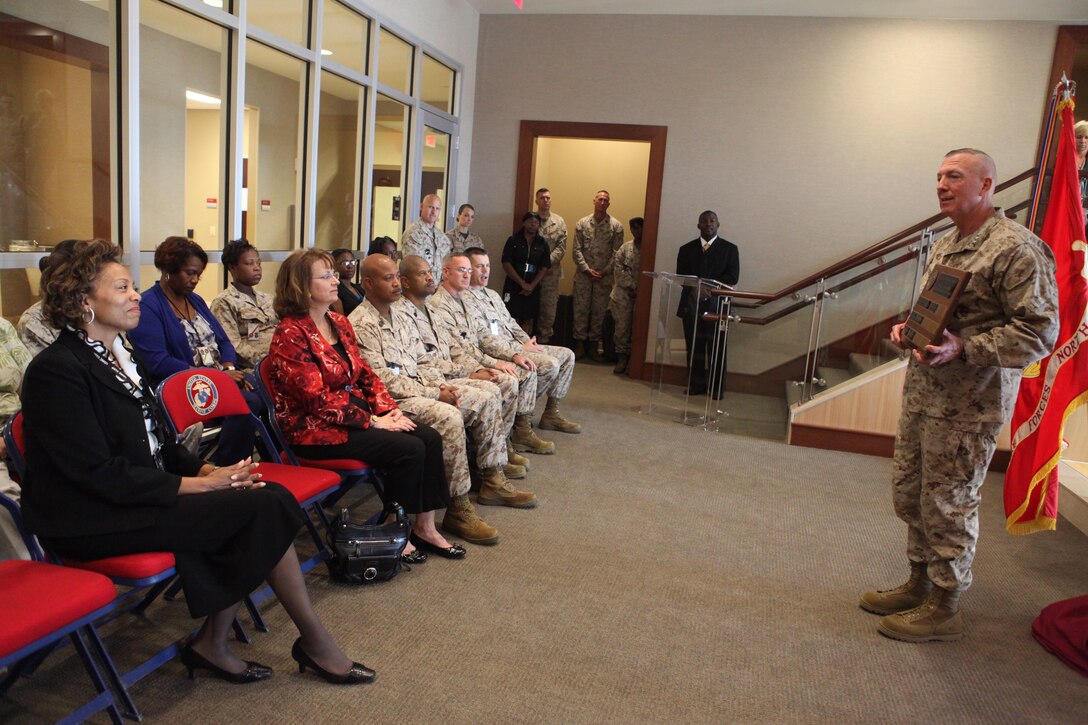 Lt. Gen. Steven A. Hummer, commander of Marine Forces Reserve, offers a few words of thanks to the local Molly Marines chapter of the Women Marines Association during a ceremony where the chapter presented MARFORRES with an award plaque at Marine Corps Support Facility New Orleans, Oct. 15. 
