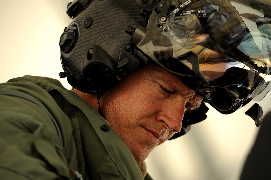 EGLIN AIR FORCE BASE, Fla. - F-35B Lightning II joint strike fighter Operations Officer and Pilot Maj. Adam Levine from the Marine Fighter Attack Training Squadron 501, Eglin Air Force Base, Fla., climbs into his jet before conducting a local training mission over the Emerald Coast Sept. 18, 2012.