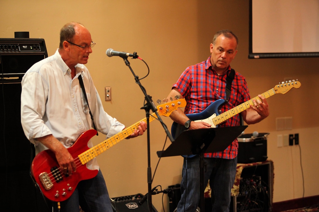MARINE CORPS BASE CAMP PENDLETON, Calif. -- Band members of the Calvary Chapel Costa Mesa Worship Team perform inspirational music during A Heart Event Fall Music Concert and Luncheon, here, Oct. 6. The event provided more than 150 active duty service women and military wives an opportunity to develop new friendships with members and representatives of the local military community.
