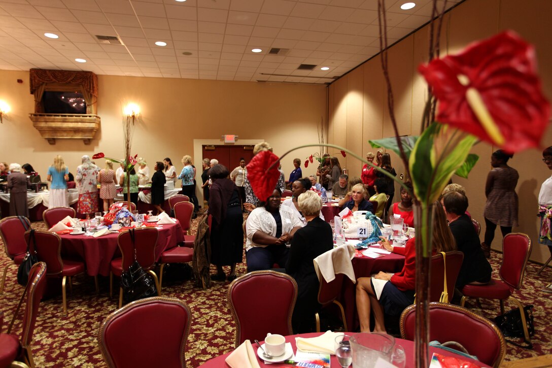 MARINE CORPS BASE CAMP PENDLETON, Calif. -- During A Heart Event Fall Music Concert and Luncheon, attendees prepare their plates before returning to their table, here, Oct. 6. The event provided more than 150 active duty service women and military wives an opportunity to develop new friendships with members and representatives of the local military community. 