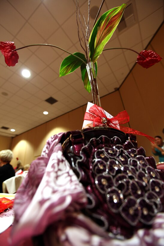 MARINE CORPS BASE CAMP PENDLETON, Calif. -- A floral center piece is displayed with one of the many handbags that were given away to attendees during A Heart Event Fall Music Concert and Luncheon, here, Oct. 6. The event provided more than 150 active duty service women and military wives an opportunity to develop new friendships with members and representatives of the local military community.