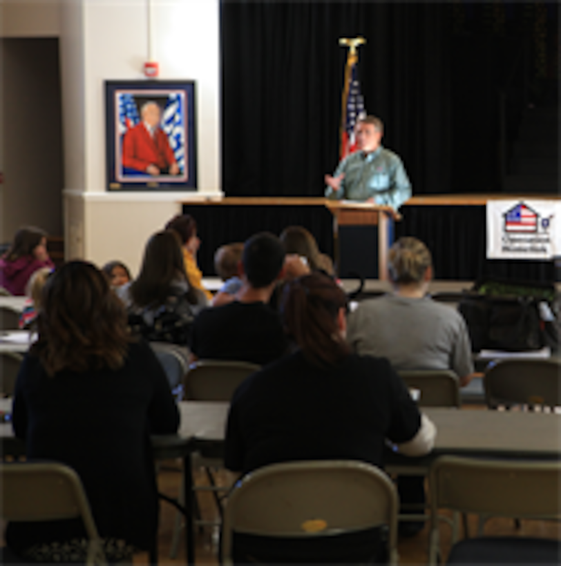 Dan Shannon, president and founder of Operation Homelink, gives a speech to the families of service members Saturday morning at the USO North Carolina Jacksonville. Before giving the families a laptop and webcam donated by supporting corporations, Shannon, explained why it was important for these families to communicate with their loved ones. Also he gave brief history of the organization and re-stated how much, the families and service members are appreciated for their sacrifices being made on behalf of the 99 percent of Americans who aren’t serving.