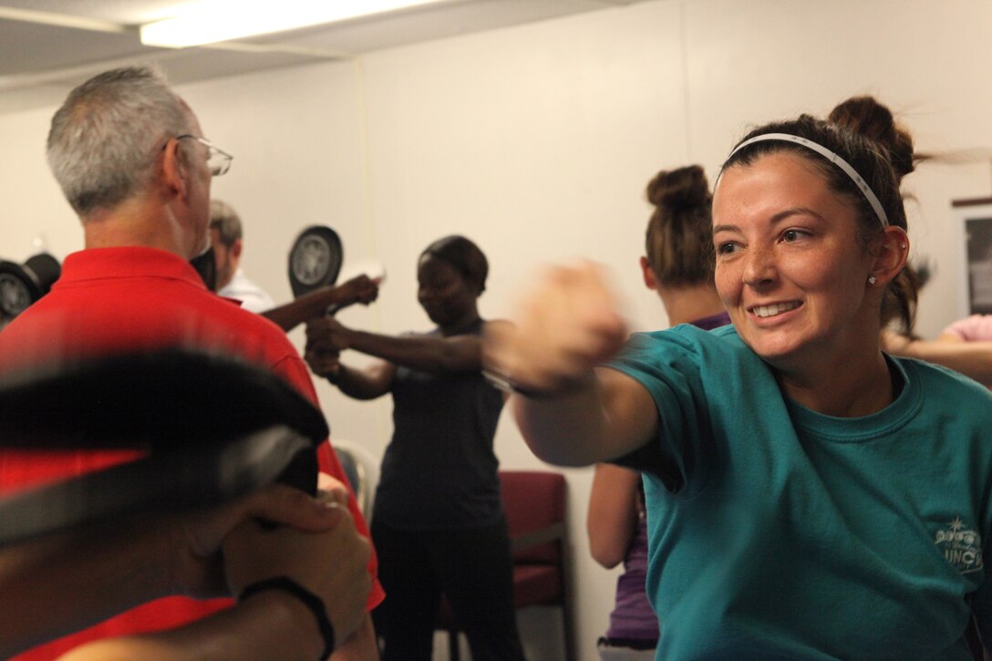 A student throws a punch during Marine Corps Family Team Building's Self-Defense 101 Oct. 3. Students learned various new techniques to defend themselves in potentially dangerous situations