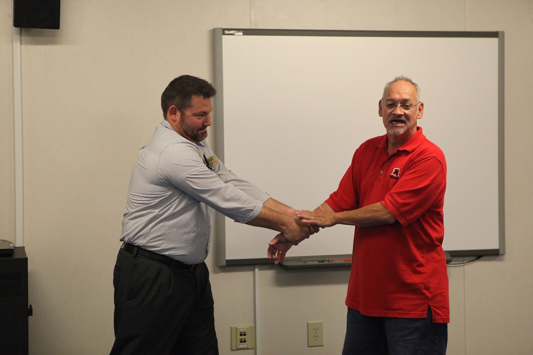 Patrick Ashton, a local martial arts instructor, demonstrates a technique during Marine Corps Family Team Building's Self-Defense 101 Oct. 3. Ashton wanted students to learn a few techniques that could save their lives in dangerous situations