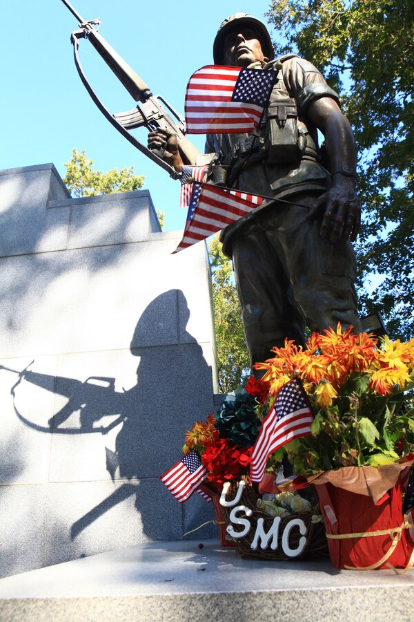 The statue of a Marine dressed in the uniform worn at the time of the 1983 bombing of the Marine barracks in Beirut, Lebanon, watches over the names of the fallen inscribed on the Beirut Memorial near Camp Lejeune, N.C., Oct. 11, 2012. Marines with Combat Logistics Battalion 6, 2nd Marine Logistics Group visited the memorial and spoke with a veteran of the conflict in Lebanon as part of an ongoing effort to keep the legacy of Beirut alive within the Marine Corps.