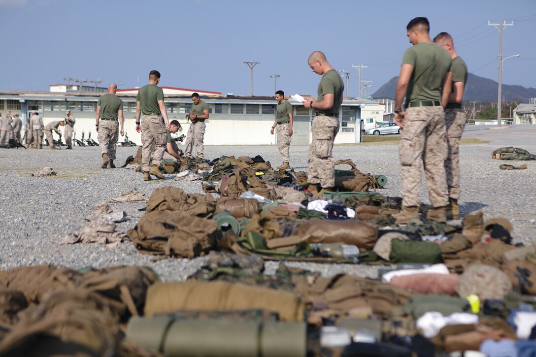 Marines with Golf Company, 2nd Battalion, 3rd Marine Regiment, prepare their gear for Exercise Croix du Sud 2012 at Camp Schwab Oct. 5. Croix du Sud is a multilateral exercise hosted by the French armed forces in New Caledonia, and will involve two U.S. Marine Corps platoons with III Marine Expeditionary Force, members of the FANC, and a company with the Australian Defence Force, as well as members of six other nations with varying levels of involvement. 2nd Bn., 3rd Marines, is currently assigned to 4th Marine Regiment, 3rd Marine Division, III MEF, under the unit deployment program.