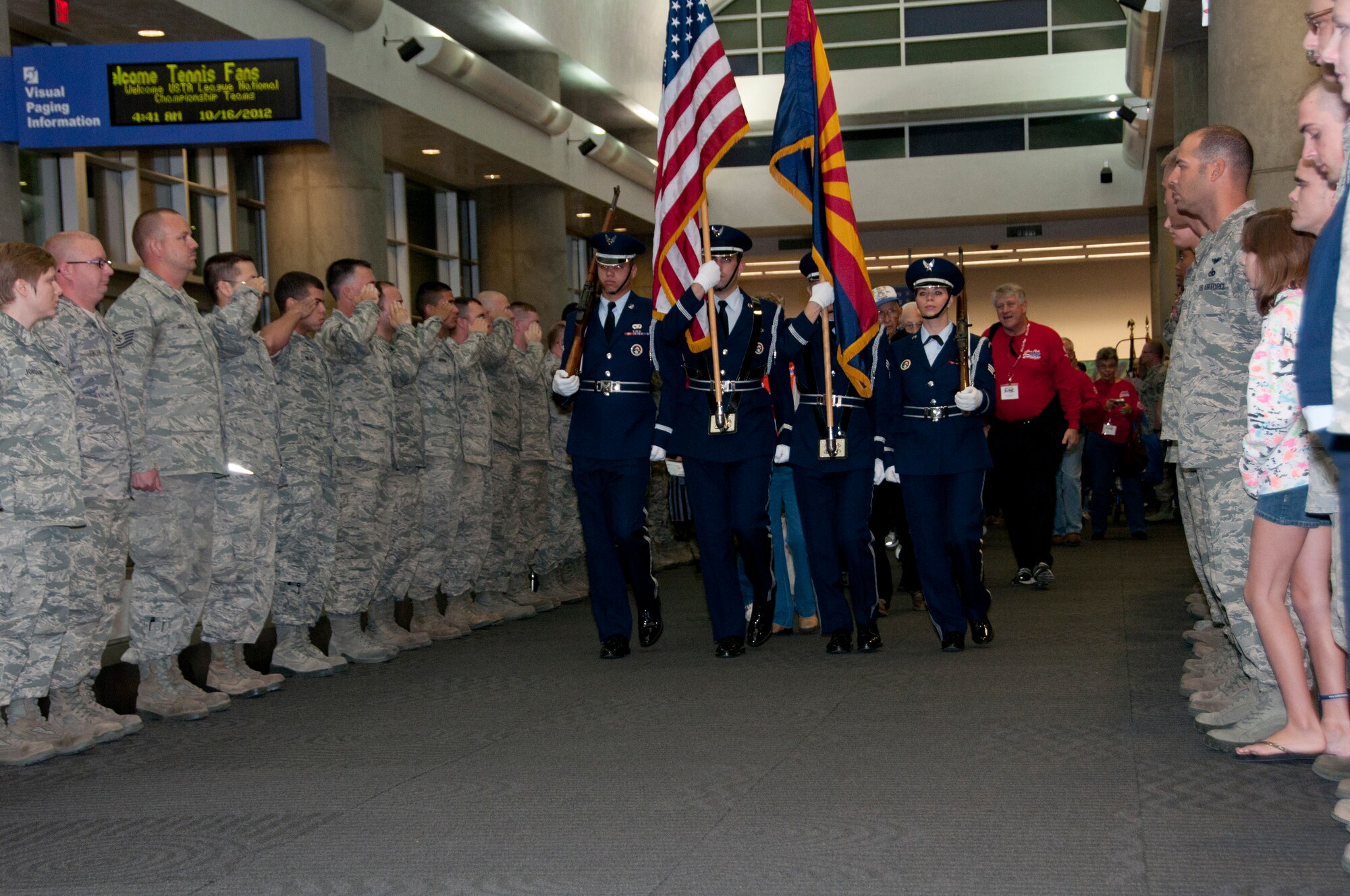 Davis-Monthan Air Force Base honor guard presents the colors during the WWII Veterans Honor Flight send-off at Tucson International Airport. (U.S. Air Force photo by Master Sgt. David Neve)