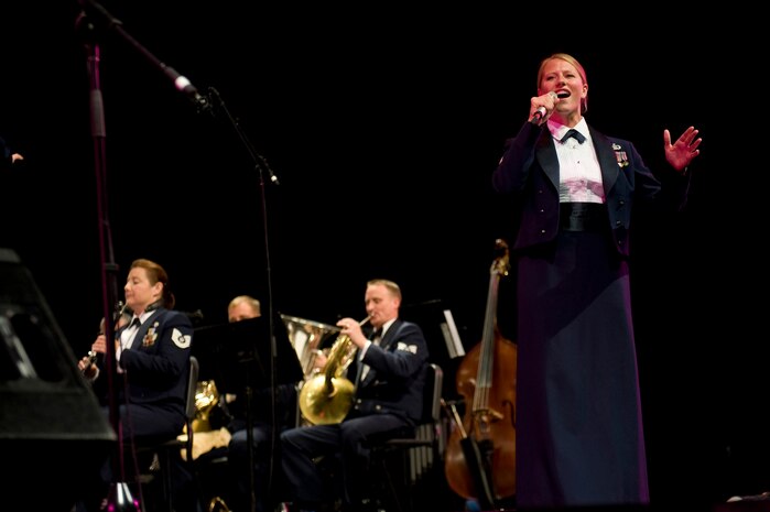 U.S. Air Force Senior Airman Megan Hokaj, Air Force Band of the Golden West vocalist, sings for a capacity crowd during a free concert at the Las Vegas Academy of the Performing Arts Oct. 12, 2012, in Las Vegas, Nev. Hokaj is the only dedicated vocalist on the 40 musicians of the AF Band of the Golden West. (U.S. Air Force photo by Senior Airman Daniel Hughes)