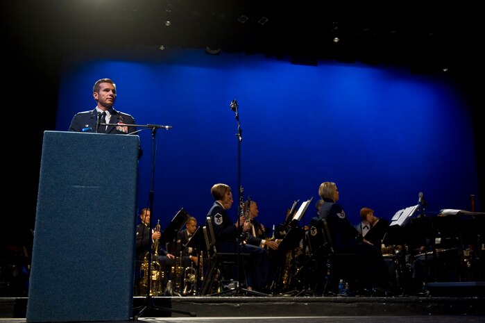 U.S. Air Force Col. Barry Cornish, 99th Air Base Wing commander, speaks before the Air Force Band of the Golden West performs at the Las Vegas Academy of Performing Arts Oct. 12, 2012, in Las Vegas, Nev. Cornish spoke to the sold out concert crowd about the upcoming open house at Nellis Air Force Base, Nov 10-11, 2012. (U.S. Air Force photo by Senior Airman Daniel Hughes)