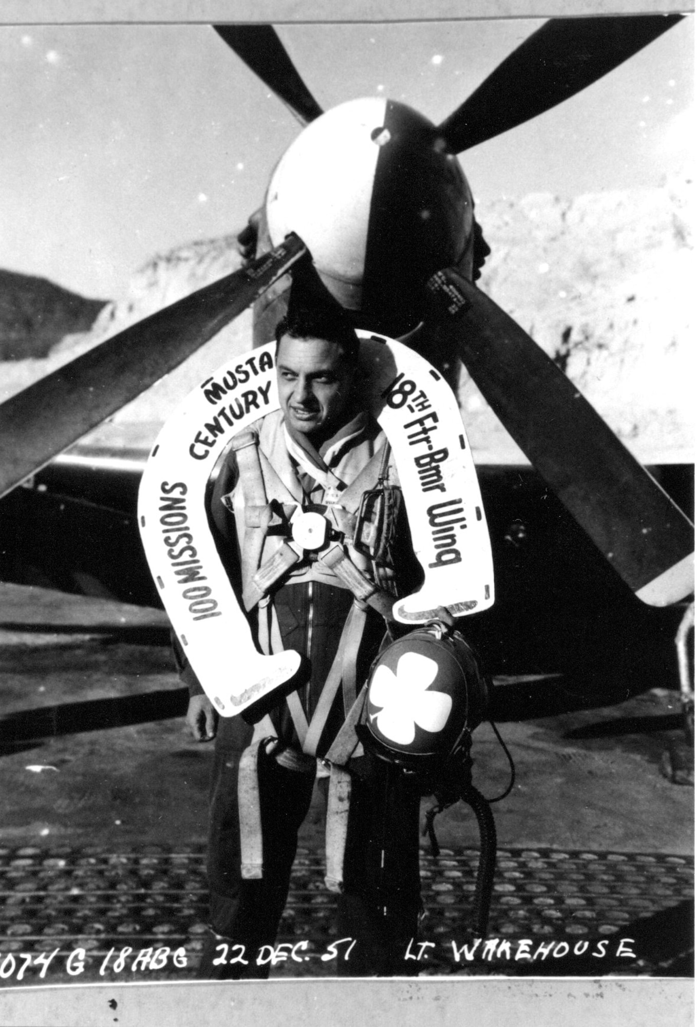 Oregon Air Guardsman Ernest Wakehouse celebrates completion of his 100th combat mission in Korea, which he flew on December 16, 1951.