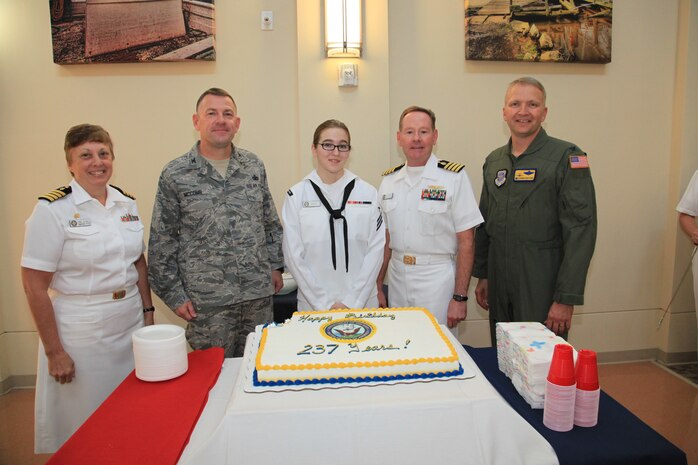 Naval Health Clinic Charleston Commanding Officer Capt. Mary Kim Kenney-Gutshall, along with Joint Base Charleston Commander Col. Richard McComb, Hospital Corpsman Chelsea Snoey, NHCC Executive Officer Capt. Richard Joralmon, and 437th Airlift Wing Commander Col. Darren Hartford pose for a photo in honor of the United States Navy’s 237th birthday celebration Oct. 12, 2012, at the NHCC on JB Charleston – Weapons Station. Snoey is NHCC’s youngest Sailor and by tradition, gets to cut the birthday cake with the command’s oldest Sailor, represented by Joralmon. (U.S. Navy photo/Russ Gutshall)