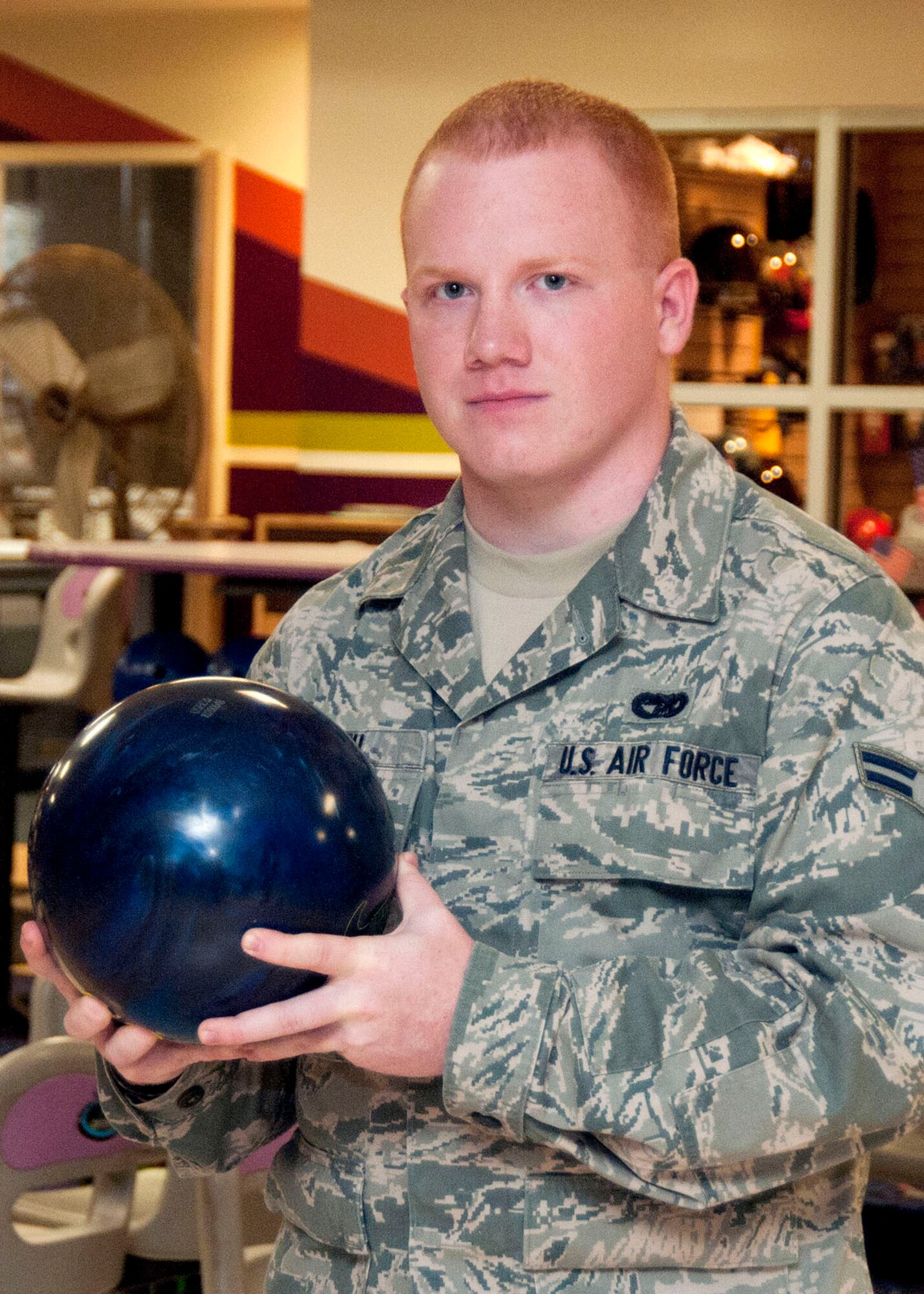 HANSCOM AIR FORCE BASE, Mass. -- Airman 1st Class Nathan Smith, Joint Personal Property Shipping Office movement support technician, poses for a shot at the Hanscom Lanes Bowling Center Oct. 15. Smith bowled a perfect 300 score Oct. 9 during his unit’s bowling league game. (U.S. Air Force photo by Mark Wyatt)
