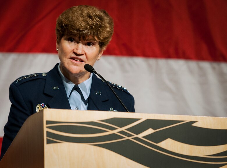 Gen. Janet Wolfenbarger, the Air Force Materiel Command commander, speaks to an audience of industry and government personnel at the Air Armament Symposium in Fort Walton Beach, Fla., Oct. 16. Wolfenbarger spoke about the state of her command and Eglin’s role within it at the 38th annual two-day symposium. Speakers from joint services and Air Force major commands shared the common thread of working together in a changing acquisition world. (U.S. Air Force photo/Samuel King Jr.)