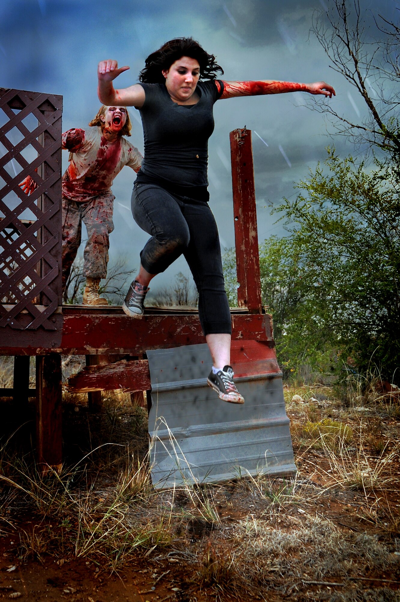 Air Commandos transform into their undead alter egos in preparation for the upcoming Zombie 5K/run obstacle course scheduled to take place at the Whispering Winds Golf Course, Oct. 19, at Cannon Air Force Base, N.M. The event, hosted by Cannon's Air Force Sergeant's Association, challenges human runners to navigate a 3.2 mile course while evading the clutches of the zombie horde that will be crawling, lumbering and sprinting after them. (U.S. Air Force illustration/Senior Airman Jette Carr)