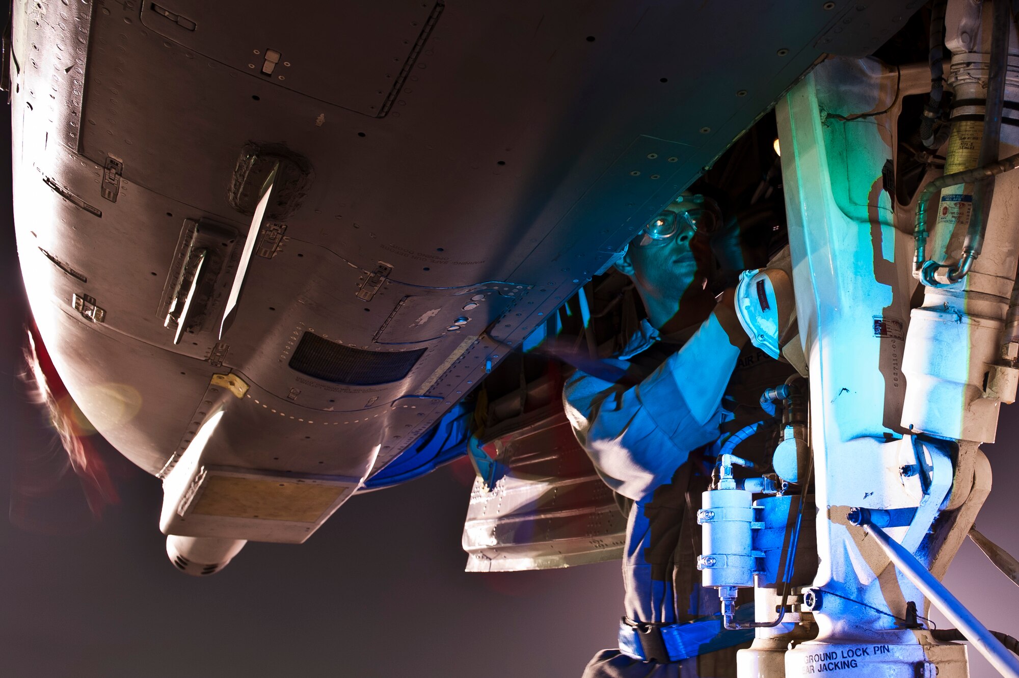 SrA Maurice Wilson, a maintainer with the 455th Expeditionary Aircraft Maintenance Squadron, works on the landing gear of a U.S. Air Force Thunderbolt II at Bagram Airfield, Afghanistan Oct. 16, 2012. Bagram maintainers work around the clock to keep their “Warthogs” ready to fly close air support missions in support of coalition ground forces. (U.S. Air Force Photo/Capt. Raymond Geoffroy)