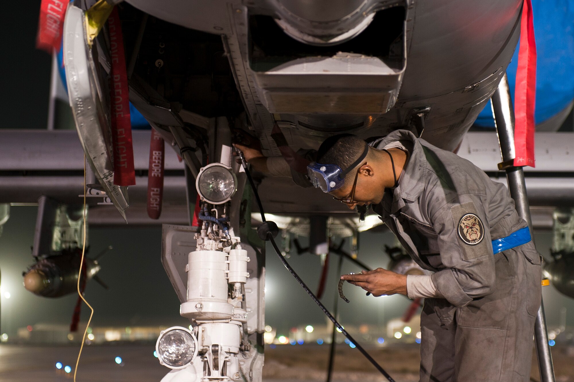 SrA Maurice Wilson, a maintainer with the 455th Expeditionary Aircraft Maintenance Squadron, works on the landing gear of a U.S. Air Force Thunderbolt II at Bagram Airfield, Afghanistan Oct. 16, 2012. Bagram maintainers work around the clock to keep their “Warthogs” ready to fly close air support missions in support of coalition ground forces. (U.S. Air Force Photo/Capt. Raymond Geoffroy)