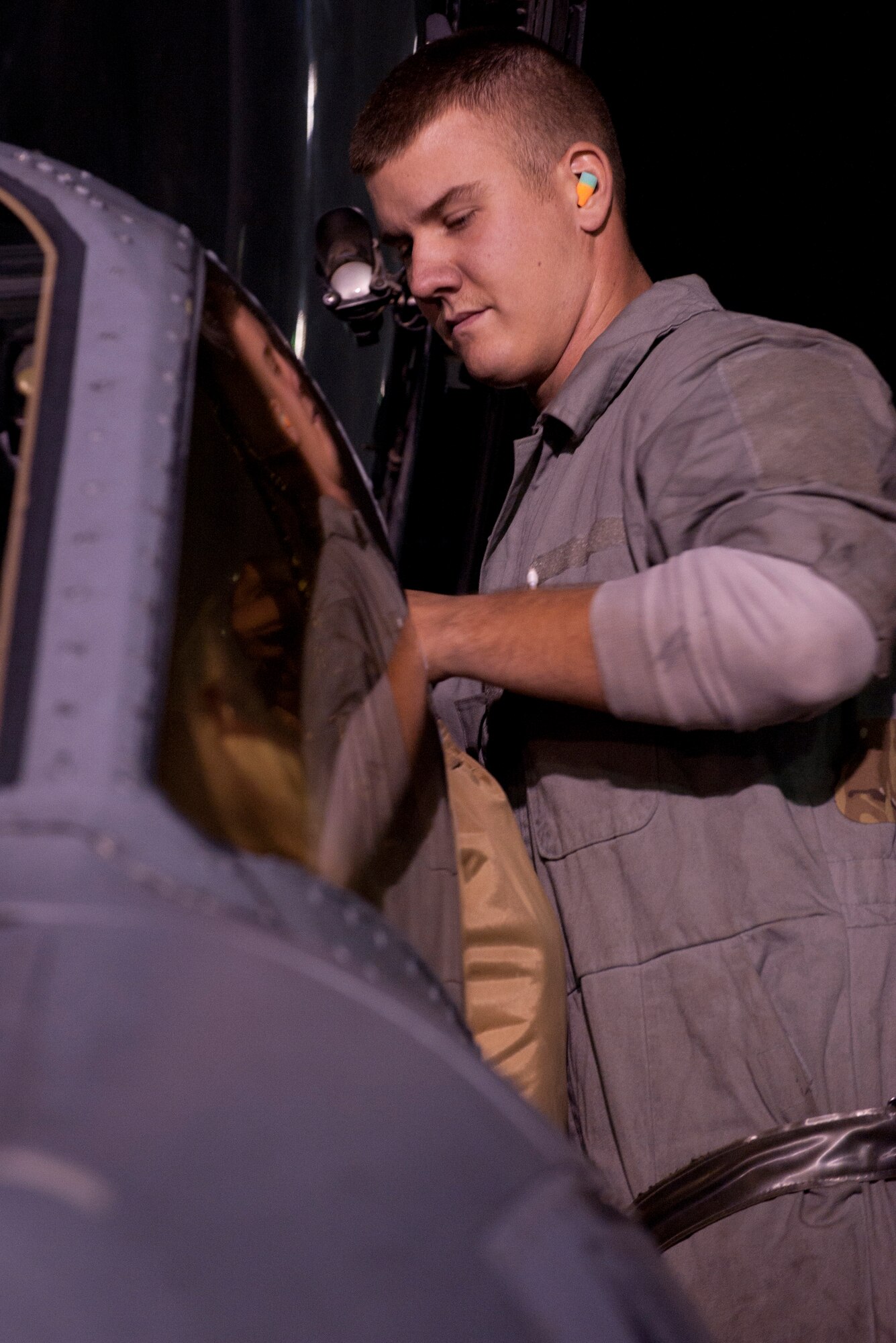 An aircraft maintainer assigned to the 455th Expeditionary Aircraft Maintenance Squadron performs a pre-mission inspection on an A-10 Thunderbolt II at Bagram Airfield, Afghanistan, Oct. 17, 2012. The A-10 is part of a squadron of “Warthogs” that recently arrived from Davis-Monthan Air Force Base, Az., to fly missions in support of American and coalition forces here in Afghanistan. (U.S. Air Force photo/SSgt Jeff Nevison)