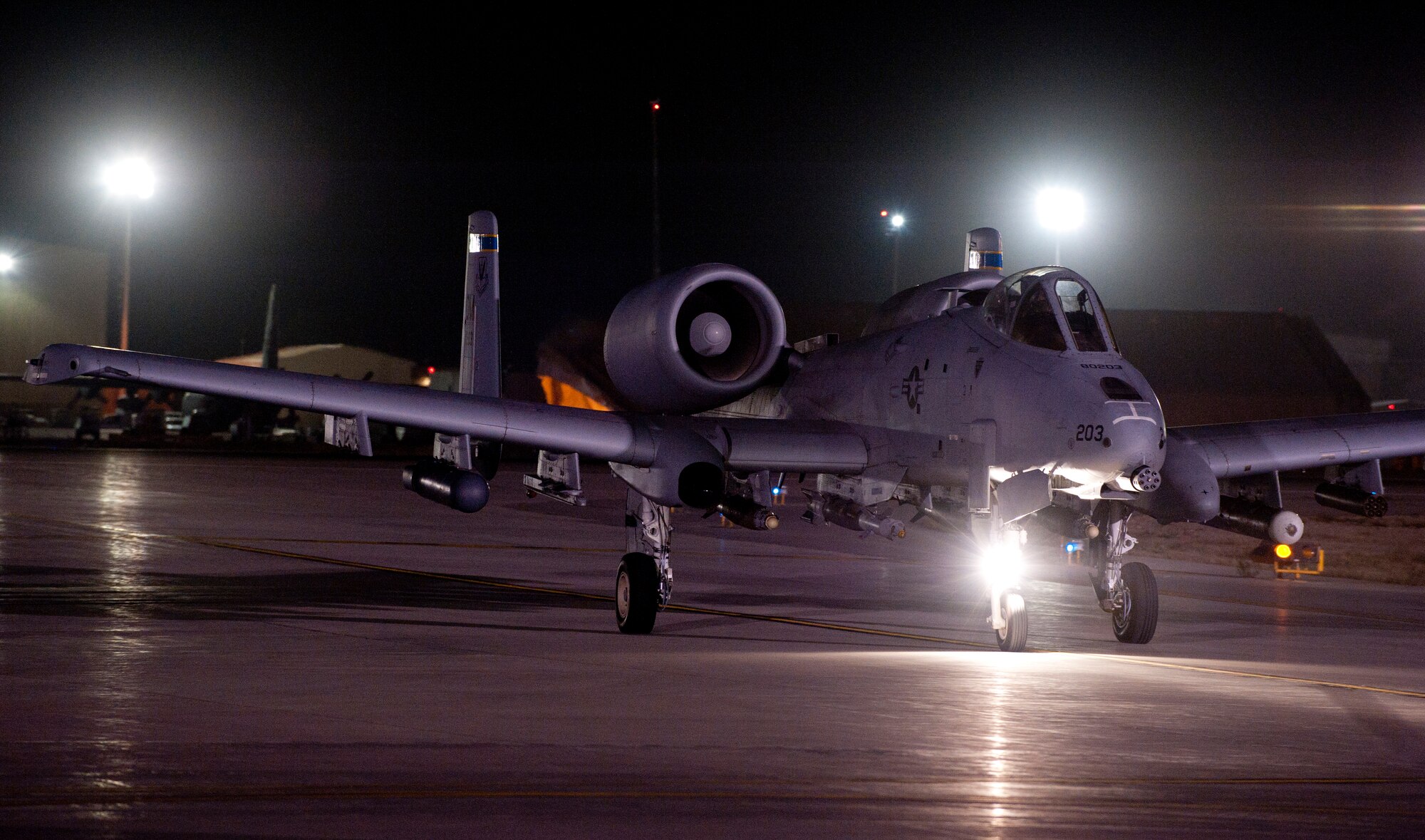 An A-10 Thunderbolt II taxis to its parking spot after a night mission at Bagram Airfield, Afghanistan, Oct. 17, 2012. The A-10 is part of a squadron of “Warthogs” that recently arrived from Davis-Monthan Air Force Base, Az., to fly missions in support of American and coalition forces here in Afghanistan. (U.S. Air Force photo/SSgt Jeff Nevison)