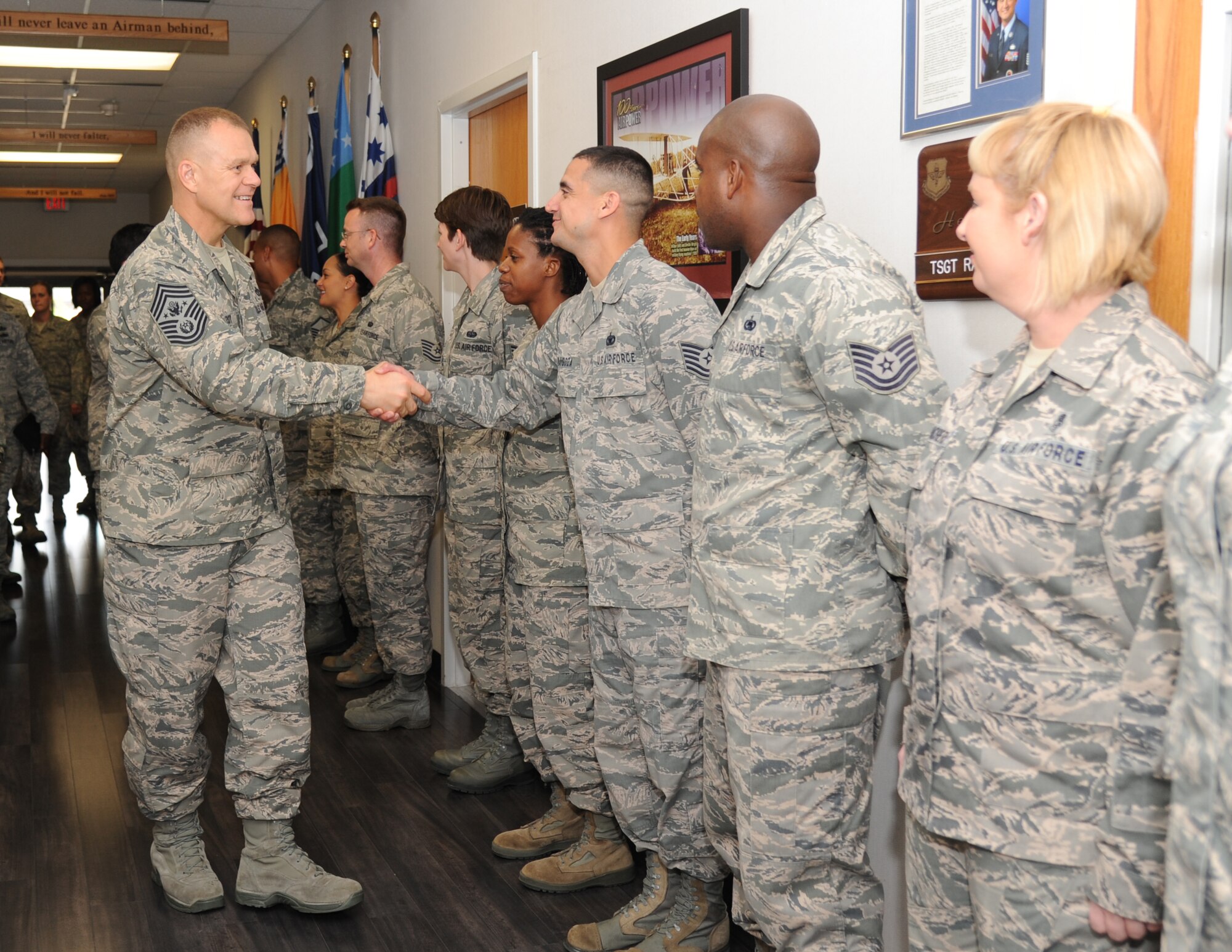 Chief Master Sgt. of the Air Force James Roy meets staff members of the Mathies NCO Academy and the Airman Leadership School during a tour at the MNCOA Oct. 16, 2012, Keesler Air Force Base, Miss. Roy discussed the importance of enlisted professional military education to career development and progression, and how PME supports the deliberate development of Airmen. Roy visited Keesler Oct. 15-17 to meet with Airmen and further his understanding of the various missions at Keesler, including the 81st Training Wing, 403rd Wing, and 2nd Air Force.  (U.S. Air Force photo by Kemberly Groue)