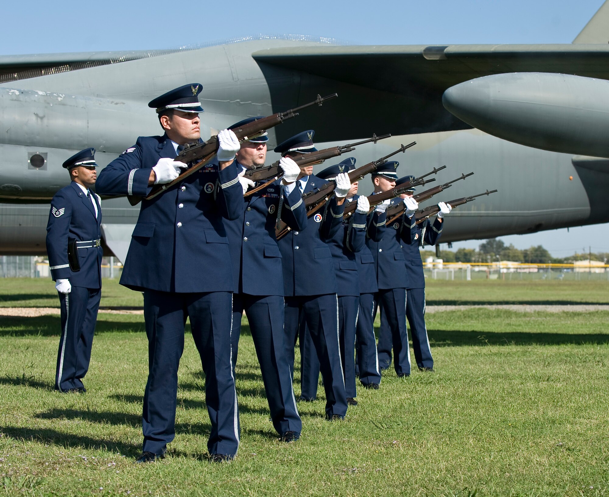 Members of the Barksdale Air Force Base Honor Guard perform a 21-gun salute during the Combat Skyspot Memorial rededication ceremony on Barksdale Air Force Base, La., Oct. 15. The ceremony, hosted by the 1st Combat Evaluation Group Association, commemorated the posthumous upgrading of Chief Master Sgt. Richard L. Etchberger's Air Force Distinguished Cross to the Medal of Honor for heroism, and Master Sgt. James H. Calfee's Bronze Star to a Silver Star for gallantry in action. (U.S. Air Force photo/Staff Sgt. Chad Warren)(RELEASED)