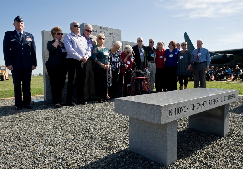 Maj. Gen. Stephen Wilson, 8th Air Force commander, stands with the family of Master Sgt. James Calfee, killed in action March 11, 1968 during the Vietnam War, as the citation to accompany his Silver Star for gallantry in action is read during the Combat Skyspot Memorial rededication ceremony on Barksdale Air Force Base, La., Oct. 15. Calfee's decoration was upgraded from a Bronze Star and presented to members of his family. (U.S. Air Force photo/Staff Sgt. Chad Warren)(RELEASED)