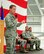 Brig. Gen. Joseph Brandemuehl (left), Wing Commander of the 115th Fighter Wing, addresses all in attendance during the change of command ceremony at Truax Field, Madison, Wis., Oct. 14. Gen. Brandemuehl relinquished command, following his retirement, to Col. Jeffrey Wiegand (center), former 115th Maintenance Group Commander, also seen is Chief Master Sgt. David Zoromski (right), Command Chief Master Sergeant of the 115th Fighter Wing. (U.S. Air Force photo by Tech. Sgt. Ashley Bell)