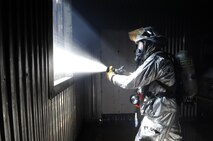 Staff Sgt. Andrew Kehoe, 8th Civil Engineer Squadron firefighter, practices hydraulic ventilation after extinguishing a fire during training with Republic of Korea Air Force firefighters Oct. 15, 2012, at Kunsan Air Base, ROK. Training together helps the firefighters exchange knowledge and become familiar with each other’s operating techniques. (U.S. Air Force photo/Senior Airman Brigitte N. Brantley)