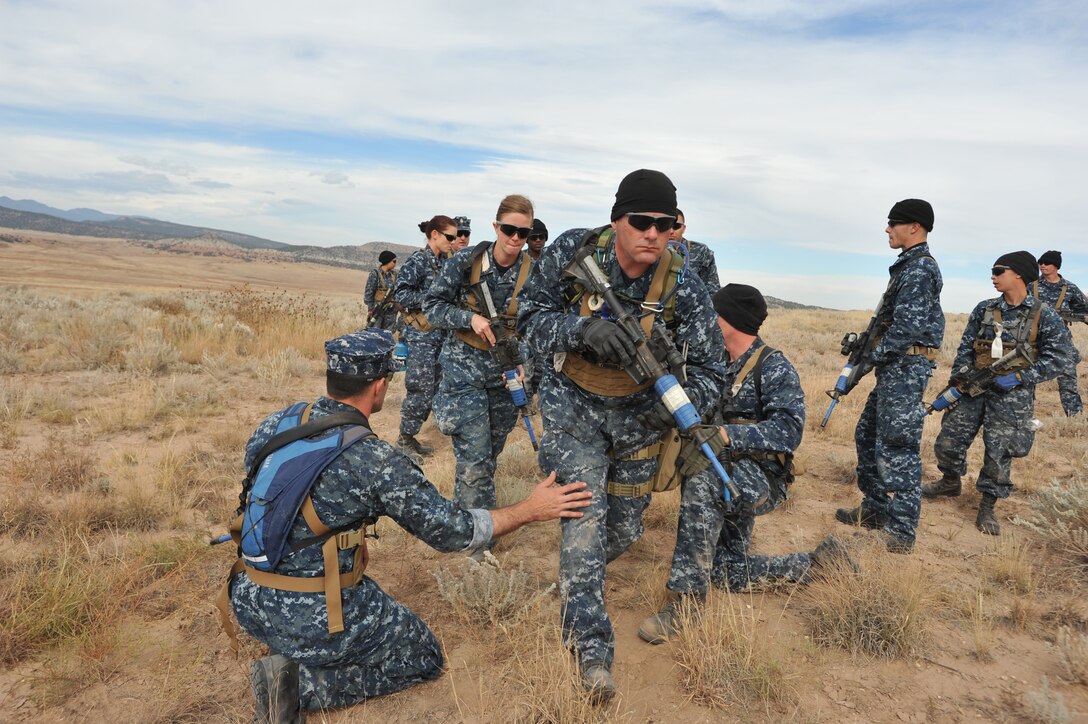 Reserve sailors receive training in combat tactical skills from members of the Army's 10th Special Forces Group Operational Detachment on Fort Carson, Colo., Oct. 10, 2012.