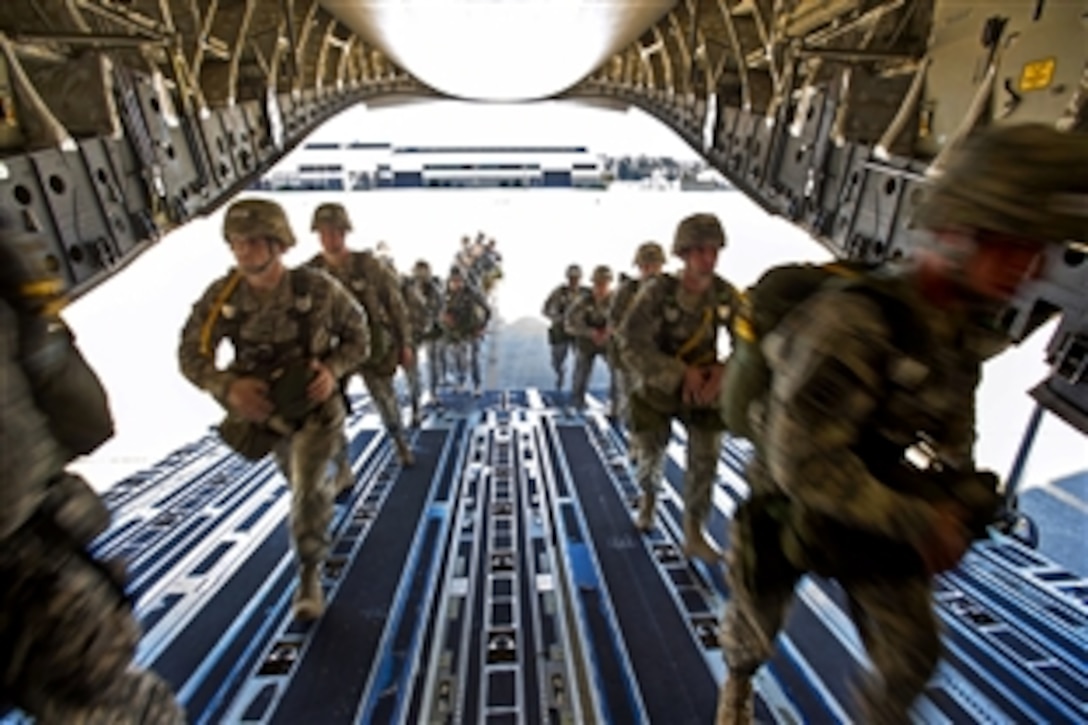 Army paratroopers load onto a C-17 Globermaster III aircraft during an airborne operations exercise on Fort Bragg, N.C., Oct. 11, 2012. The soldiers are assigned to the 82nd Airborne Division.