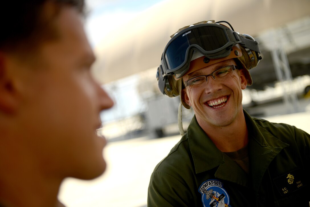 F-35B Lightning II joint strike fighter Operations Officer and Pilot Maj. Adam Levine and Power line Mechanic Sgt. Stephen Fink from the Marine Fighter Attack Training Squadron 501, Eglin Air Force Base, Fla.,  talk about Levine's flight after conducting a local training mission over the Emerald Coast Sept. 18, 2012.