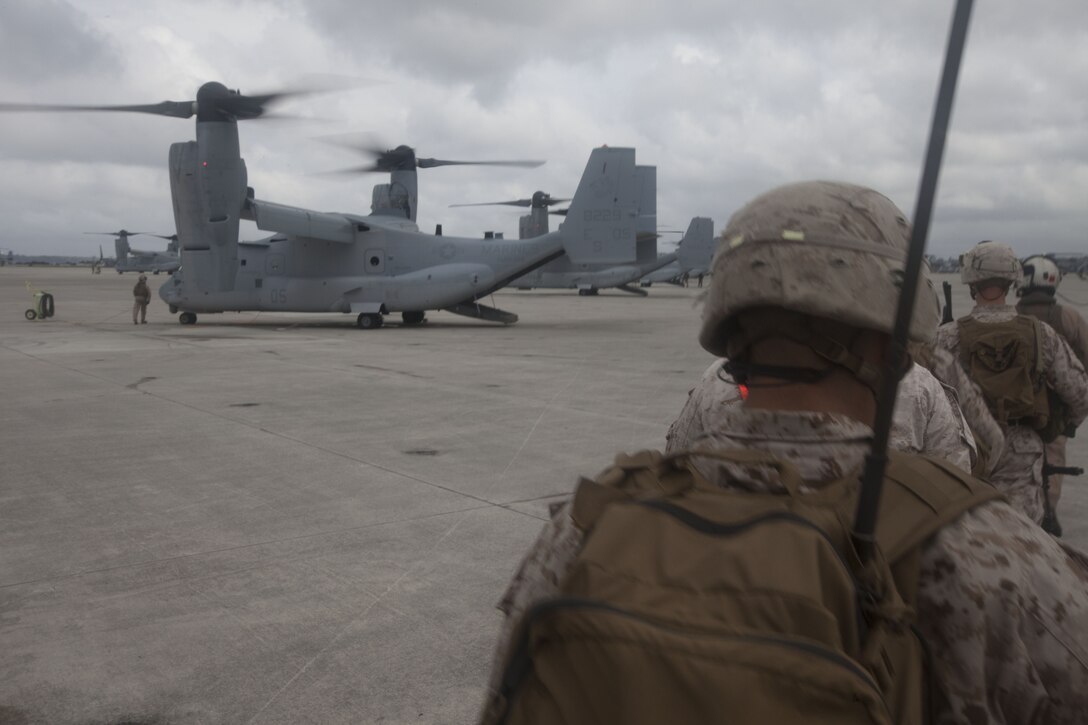 Marines with India Company, Battalion Landing Team (BLT) 3/2, 26th Marine Expeditionary Unit (MEU), walk toward an MV-22B Osprey at Marine Corps Air Station New River, N.C., Oct. 2, 2012. The company conducted a two-week vertical assault raid package with the Special Operation Training Group in order to help fulfill requirements from the 26th MEU’s mission essential task list. The 26th MEU is slated to deploy in 2013.