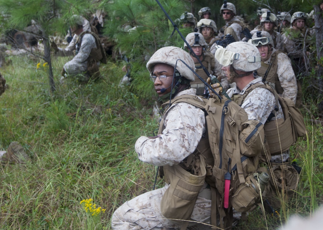 Marines with India Company, Battalion Landing Team (BLT) 3/2, 26th Marine Expeditionary Unit (MEU), set up a perimeter while awaiting air extraction during a simulated raid at Marine Corps Base Camp Lejeune, N.C., Oct. 2, 2012. The company conducted a two-week vertical assault raid package with the Special Operation Training Group in order to help fulfill requirements from the 26th MEU’s mission essential task list. The 26th MEU is slated to deploy in 2013.