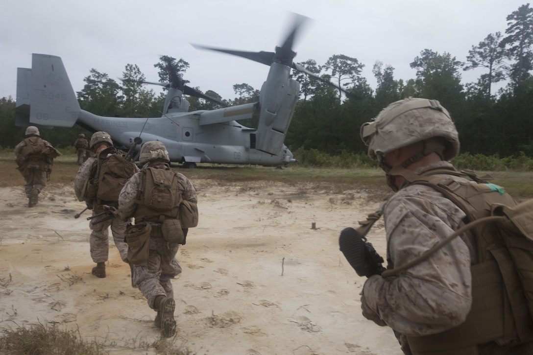 Marines with India Company, Battalion Landing Team (BLT) 3/2, 26th Marine Expeditionary Unit (MEU), run to an MV-22B Osprey for extraction during a simulated raid at Marine Corps Base Camp Lejeune, N.C., Oct. 2, 2012. The company conducted a two-week vertical assault raid package with the Special Operation Training Group in order to help fulfill requirements from the 26th MEU’s mission essential task list. The 26th MEU is slated to deploy in 2013.