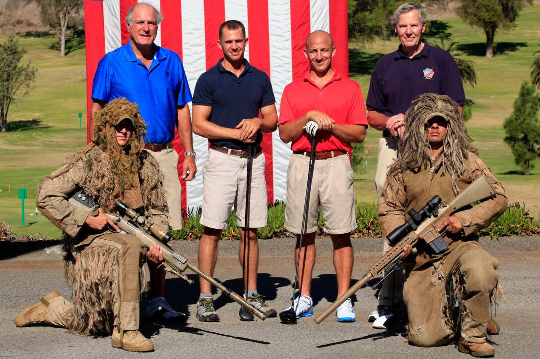 A group of golfers (Team 18A) gather for a group photograph with Marine snipers from 1st Reconnaissance Battalion during the Commanding General’s 1st Invitational Golf Tournament at Camp Pendleton’s Marine Memorial Golf Course, Oct. 15.
