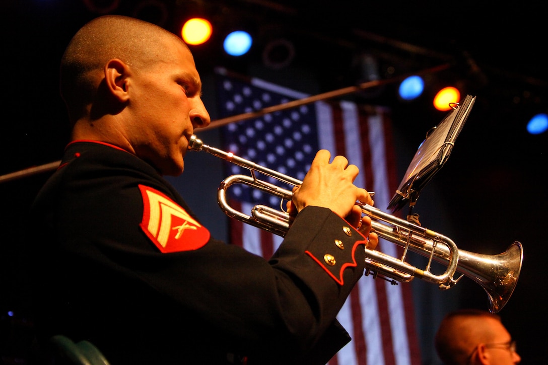 Manitowoc, Wis., native Cpl. Jeffery Clapper plays the trumpet during a concert at the Topsfield Fair. The all-Marine band serenaded the large audience with classical tunes ranging from John Philip Sousa’s “The Stars and Stripes Forever,” to their own rendition of “The Saints.”