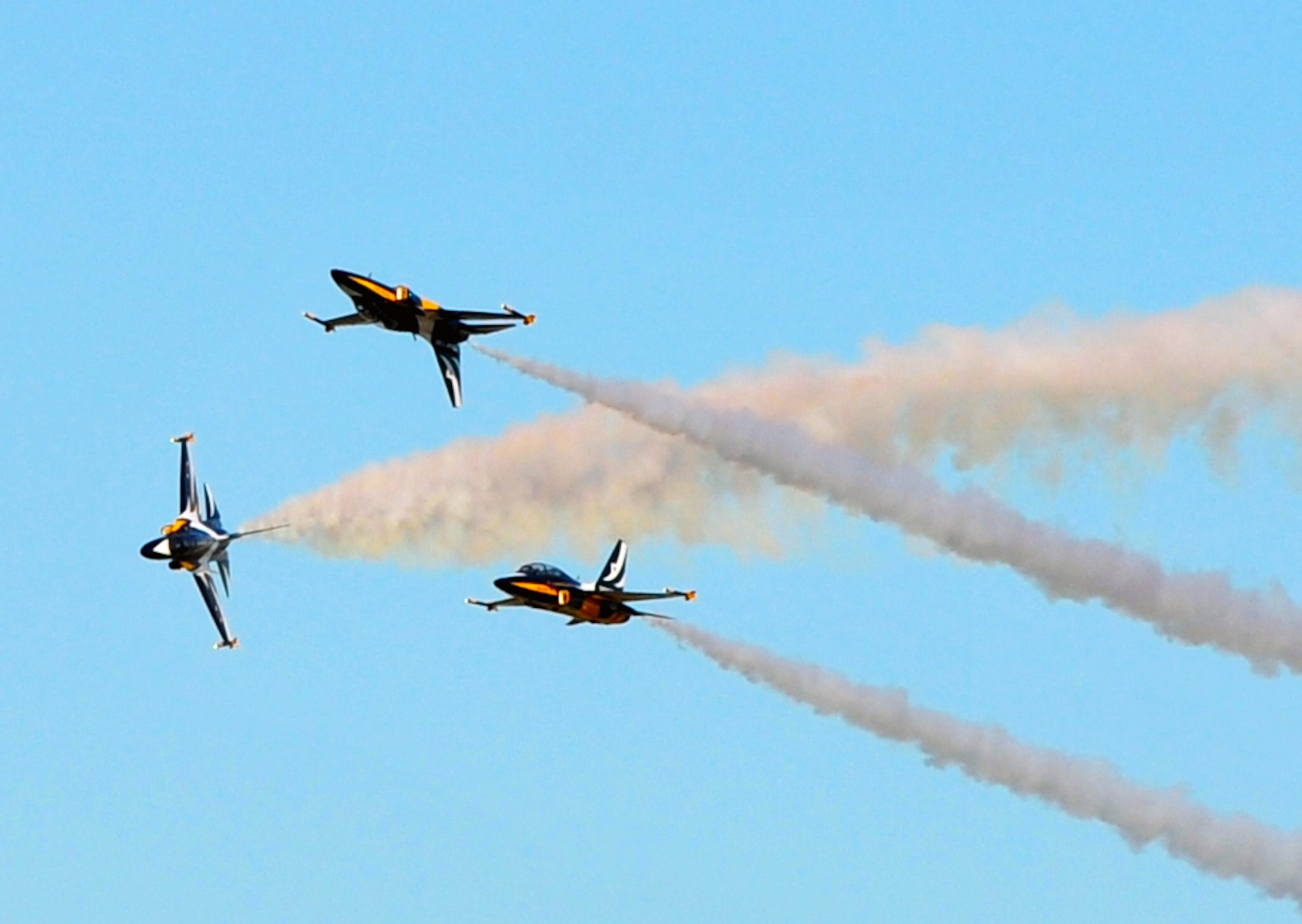 The Black Eagles perform aerial maneuvers over Osan Air Base Oct. 18, 2012, in preparation for Air Power Day Oct. 20-21, 2012. The team can perform up to 30 different types of acrobatics using T-50B training aircraft with supersonic capabilities. (U.S. Air Force photo/Staff Sgt. Stefanie Torres)