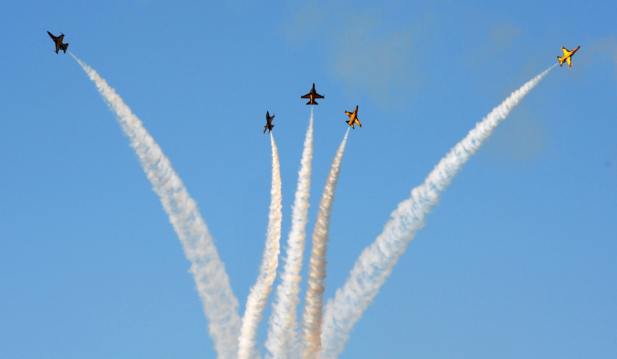 The Black Eagles perform aerial maneuvers over Osan Air Base Oct. 18, 2012, in preparation for Air Power Day Oct. 20-21, 2012. The team can perform up to 30 different types of acrobatics using T-50B training aircraft with supersonic capabilities. (U.S. Air Force photo/Staff Sgt. Stefanie Torres)